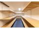 This is a storage room with wall-mounted shelves to keep your household items organized at 860 Bramblewood Dr, Castle Pines, CO 80108