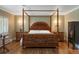 Spacious main bedroom with hardwood floors, ornate furniture, and ambient lighting at 395 N Franklin St, Denver, CO 80218