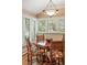 Inviting breakfast nook with plenty of natural light and hardwood floors at 395 N Franklin St, Denver, CO 80218