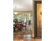 Formal dining room with a large wooden table, stylish rug, and french doors to outdoor space at 395 N Franklin St, Denver, CO 80218