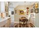 Charming kitchen with a breakfast nook, custom decorations, and hardwood floors at 395 N Franklin St, Denver, CO 80218