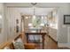 Open-concept kitchen with stainless appliances, custom cabinetry and a central island at 395 N Franklin St, Denver, CO 80218