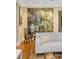 Elegant living area showcasing unique art, hardwood floors, and comfortable seating at 395 N Franklin St, Denver, CO 80218