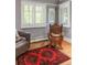 Comfortable sitting area with hardwood floors, ornate furnishings, and plenty of light at 395 N Franklin St, Denver, CO 80218