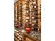 Wine cellar featuring horizontal storage racks, marble countertop and decorative baskets and containers at 395 N Franklin St, Denver, CO 80218