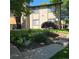 Inviting exterior view featuring a well-maintained lawn and a charming stone accent on the facade at 1755 S Pitkin St # B, Aurora, CO 80017
