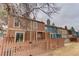 A view of the home's backyard, surrounded by a well-maintained wooden privacy fence for outdoor enjoyment at 11973 E Kepner Dr, Aurora, CO 80012