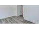 Bedroom featuring stylish gray floors and a closet at 11973 E Kepner Dr, Aurora, CO 80012
