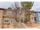View of a multi-Gathering house, showcasing the unique architectural details and the surrounding landscape at 11973 E Kepner Dr, Aurora, CO 80012