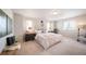 Serene primary bedroom retreat featuring carpet floors, natural lighting and decorative accents at 13518 E 103Rd Pl, Commerce City, CO 80022