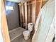 Bathroom features new toilet and modern shower at 6608 Hooker St, Denver, CO 80221