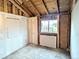 Bedroom with original hardwood flooring and natural light from the window at 6608 Hooker St, Denver, CO 80221