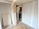 Unfinished room awaiting personalized touches, featuring exposed framing and blank drywall walls at 6608 Hooker St, Denver, CO 80221