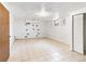 Finished basement featuring tiled floors, white walls, and a small window for natural light at 12022 W Louisiana Ave, Lakewood, CO 80228