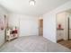 Bedroom with carpet, sliding door closet and ensuite bathroom at 22093 E 38Th Pl, Aurora, CO 80019