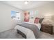 Bedroom with carpet, a view, and warm décor at 22093 E 38Th Pl, Aurora, CO 80019