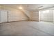 Spacious unfinished garage ready for customization and storage; features concrete floors and high ceilings at 22093 E 38Th Pl, Aurora, CO 80019