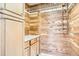 Cedar closet with wooden paneled walls and cabinets at 3131 E Alameda Ave # 1503, Denver, CO 80209