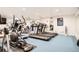 Community gym with treadmills, ellipticals, and fitness equipment at 3131 E Alameda Ave # 1503, Denver, CO 80209