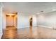 Bright, open living room features wood floors with an adjacent entryway at 3131 E Alameda Ave # 1503, Denver, CO 80209