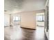 Expansive living room showcases hardwood floors, and natural lighting at 3131 E Alameda Ave # 1503, Denver, CO 80209