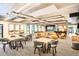 Spacious resident lounge featuring soft seating, tables and chairs, and a modern design at 3131 E Alameda Ave # 1503, Denver, CO 80209