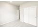 Bright bedroom with closet space, carpeted floors, and ample natural light, creating a serene and inviting atmosphere at 24088 E Atlantic Pl, Aurora, CO 80018