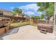 Fenced backyard featuring a patio, hot tub, and established landscaping at 11407 W 103Rd Ave, Broomfield, CO 80021
