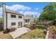 Spacious backyard with a patio, hot tub, and manicured lawn at 11407 W 103Rd Ave, Broomfield, CO 80021