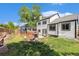 Backyard featuring a lush lawn, patio, and privacy fence at 11407 W 103Rd Ave, Broomfield, CO 80021