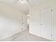 Neutral bedroom with two closets, neutral carpet, and ample space at 11407 W 103Rd Ave, Broomfield, CO 80021