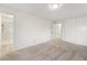 Spacious carpeted bedroom with ample storage and an attached bathroom at 11407 W 103Rd Ave, Broomfield, CO 80021
