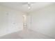 Neutral bedroom with multiple closets, neutral carpet, and ceiling fan at 11407 W 103Rd Ave, Broomfield, CO 80021