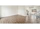 Spacious living room featuring wood floors and plenty of natural light at 11407 W 103Rd Ave, Broomfield, CO 80021