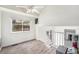 Loft-style living area featuring vaulted ceilings and wood floors at 11407 W 103Rd Ave, Broomfield, CO 80021