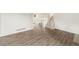 Open-concept living space with modern flooring and neutral paint at 11407 W 103Rd Ave, Broomfield, CO 80021
