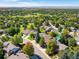 Panoramic aerial view of the neighborhood showcasing the mature trees and proximity to amenities at 7869 S Valentia St, Centennial, CO 80112