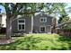 Spacious backyard featuring an outdoor seating area, perfect for entertaining guests at 7869 S Valentia St, Centennial, CO 80112