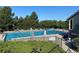 Community pool with ample seating and lifeguard station, perfect for summer fun at 7869 S Valentia St, Centennial, CO 80112