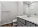 Bathroom featuring granite countertops, gray cabinets, and modern fixtures at 14378 Heritage Dr, Mead, CO 80504
