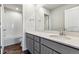Bathroom featuring a white quartz countertop and stylish fixtures at 14378 Heritage Dr, Mead, CO 80504