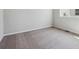 Bedroom with neutral carpet and bright natural light from the large window at 14378 Heritage Dr, Mead, CO 80504