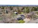 Aerial view of the property with a large backyard and detached storage shed at 6893 S High St, Centennial, CO 80122