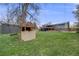 Large backyard with a playhouse and lawn at 6893 S High St, Centennial, CO 80122