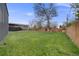 Sprawling backyard with large lawn and shed at 6893 S High St, Centennial, CO 80122