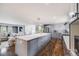 Bright kitchen with an island, stainless steel appliances, and an open concept layout at 6893 S High St, Centennial, CO 80122