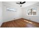 Bedroom with hardwood floors and natural light at 5698 E Greenwood Pl, Denver, CO 80222