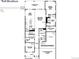 Floor plan of the first floor, which features a kitchen, living area, and 3-car tandem garage at 3027 Newfound Lake Rd, Berthoud, CO 80513