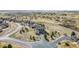 Aerial view of a home situated in a neighborhood with open spaces and landscaping at 5285 La Quinta Cir, Elizabeth, CO 80107