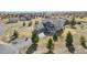 View of a two-story home with an attached garage and a long driveway at 5285 La Quinta Cir, Elizabeth, CO 80107